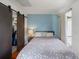 Bedroom with a sliding closet door and a view to the backyard at 11602 Innfields Dr, Odessa, FL 33556