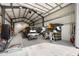 Spacious garage with plenty of room for parking and storage, as well as laundry facilities at 11602 Innfields Dr, Odessa, FL 33556