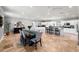 Open-concept kitchen and dining area with modern appliances and ample seating, perfect for entertaining at 11602 Innfields Dr, Odessa, FL 33556