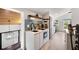 Charming kitchenette with modern appliances, wood accents, and lots of natural light at 11602 Innfields Dr, Odessa, FL 33556