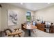 Cozy office area with a desk, chair, and view of the outside at 11602 Innfields Dr, Odessa, FL 33556