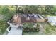 Aerial view of the home featuring a private backyard with multi-level deck at 1513 Owen Dr, Clearwater, FL 33759