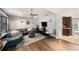 Spacious living room with stylish furniture, hardwood floors, and an open layout at 1513 Owen Dr, Clearwater, FL 33759