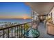 Enjoy panoramic ocean and beach views from this condo balcony at sunset at 1600 Gulf Blvd # 618, Clearwater, FL 33767