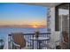 Relax on the balcony with seating and enjoy breathtaking ocean views at sunset at 1600 Gulf Blvd # 618, Clearwater, FL 33767