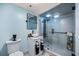 Bathroom with glass enclosed shower, modern fixtures, and vanity sink at 1600 Gulf Blvd # 618, Clearwater, FL 33767
