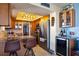 Stylish kitchen features stainless steel appliances, granite counters, ample cabinet space, and a wine fridge at 1600 Gulf Blvd # 618, Clearwater, FL 33767