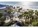 Private pool, palm trees, and beach provide a serene escape at 1600 Gulf Blvd # 618, Clearwater, FL 33767
