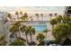 Enjoy the private community pool with tropical landscaping and beach access at 1600 Gulf Blvd # 618, Clearwater, FL 33767