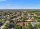 Community aerial view highlighting the neighborhood's lush trees and well-maintained homes at 1608 Ledgestone Dr, Brandon, FL 33511