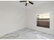 Bright bedroom with ceiling fan and stylish marble flooring at 1608 Ledgestone Dr, Brandon, FL 33511