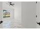 Bright bedroom with large window and stylish marble flooring at 1608 Ledgestone Dr, Brandon, FL 33511