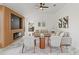 Comfortable living room features a stylish fireplace, neutral furnishings, and a bright, inviting atmosphere at 1608 Ledgestone Dr, Brandon, FL 33511