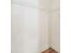 Empty walk-in closet with wooden floors and white wire shelving at 1886 San Mateo Dr, Dunedin, FL 34698