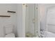 Modern bathroom features marble floors and a glass-enclosed shower at 1979 E Skyline Dr, Clearwater, FL 33763