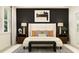 Serene bedroom with a large bed, decorative pillows, side tables with lamps, and a soothing color palette at 22075 Storybook Cabin Way, Land O Lakes, FL 34637