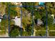 Aerial view of a property with blue boundary lines showing the shape of the lot and the surrounding area at 235 83Rd Ne Ave, St Petersburg, FL 33702