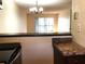 Kitchen with bar counter looking into the living room at 2625 State Road 590 # 1822, Clearwater, FL 33759