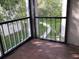 Private tiled patio overlooking a lush green lawn and landscaped walkway at 2625 State Road 590 # 1822, Clearwater, FL 33759
