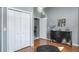 Bedroom featuring hardwood floors, closet and decorative furniture at 2990 Eagle Estates W Cir, Clearwater, FL 33761