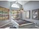 Game room with pool table, natural light, and modern decor at 2990 Eagle Estates W Cir, Clearwater, FL 33761