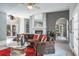 Inviting living room featuring a marble fireplace and comfortable seating at 2990 Eagle Estates W Cir, Clearwater, FL 33761