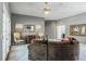 Spacious living room with neutral gray walls and a plush sofa at 2990 Eagle Estates W Cir, Clearwater, FL 33761