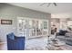 Bright living room with French doors and stylish furniture at 2990 Eagle Estates W Cir, Clearwater, FL 33761