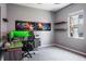 Home office with modern desk, shelving, and a bright window at 2990 Eagle Estates W Cir, Clearwater, FL 33761