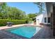 Gorgeous pool and spa area with lush landscaping and serene privacy at 2990 Eagle Estates W Cir, Clearwater, FL 33761