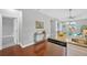 Open kitchen area with granite counters, seamlessly connecting to the dining space at 3002 E 24Th Ave, Tampa, FL 33605