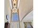 Grand foyer featuring a chandelier and high ceilings at 3243 Ashmonte Dr, Land O Lakes, FL 34638