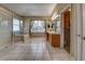 Bright main bathroom boasts a glass-enclosed shower, soaking tub, double vanity and walk-in closet at 3243 Ashmonte Dr, Land O Lakes, FL 34638