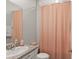 Bathroom with a vanity, toilet, and bathtub, showcasing a cozy and functional design at 33581 Elm Hill Br, Wesley Chapel, FL 33545
