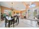Spacious dining area leads to the foyer, boasting tile floors and natural light at 4111 70Th E Ave, Ellenton, FL 34222