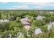 Beautiful home surrounded by lush greenery and a serene pond, offering privacy and a scenic view at 4111 70Th E Ave, Ellenton, FL 34222