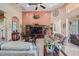 Inviting living room with high ceilings, neutral color palette, and ample seating at 4111 70Th E Ave, Ellenton, FL 34222