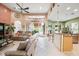 Open-concept living room featuring high ceilings and seamless access to outdoor patio at 4111 70Th E Ave, Ellenton, FL 34222