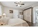 Comfortable bedroom with wooden floors, barn style closet, and access to living areas at 4462 2Nd S Ave, St Petersburg, FL 33711