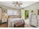 Cozy bedroom with neutral tones, natural light, and access to outdoor space at 4462 2Nd S Ave, St Petersburg, FL 33711