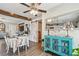 Stylish dining room with hardwood floors, modern light fixture, and decorative cabinet at 4462 2Nd S Ave, St Petersburg, FL 33711