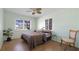 Bedroom featuring natural light, a ceiling fan, and neutral tones for a relaxing atmosphere at 5000 18Th S Ave, Gulfport, FL 33707