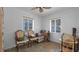 Bright sitting room with natural light, decorative accents, and cozy furnishings at 5000 18Th S Ave, Gulfport, FL 33707