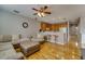 Cozy living space with kitchen access, bar stools, and comfortable seating at 5033 Blue Runner Ct, New Port Richey, FL 34652