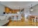 Inviting kitchen with bar seating flows into the open-concept living space at 5033 Blue Runner Ct, New Port Richey, FL 34652