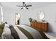 Bright bedroom showcasing contemporary decor and a ceiling fan at 7535 Abonado Rd, Tampa, FL 33615