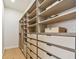 Custom walk-in closet with ample storage and drawer space at 7974 1St S Ave, St Petersburg, FL 33707