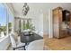 Kitchen with wood cabinets adjacent to the dining area at 7974 1St S Ave, St Petersburg, FL 33707