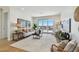 Open living room area with sliding glass doors and balcony at 7974 1St S Ave, St Petersburg, FL 33707