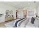 Bright main bedroom with access to en suite bath and walk-in closets at 7974 1St S Ave, St Petersburg, FL 33707